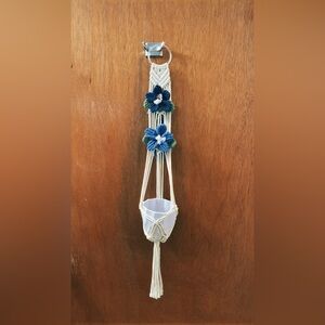Handcrafted Macrame Plant Hanger with Blue Floral Accents